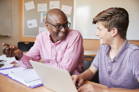 A tutor helping a student.